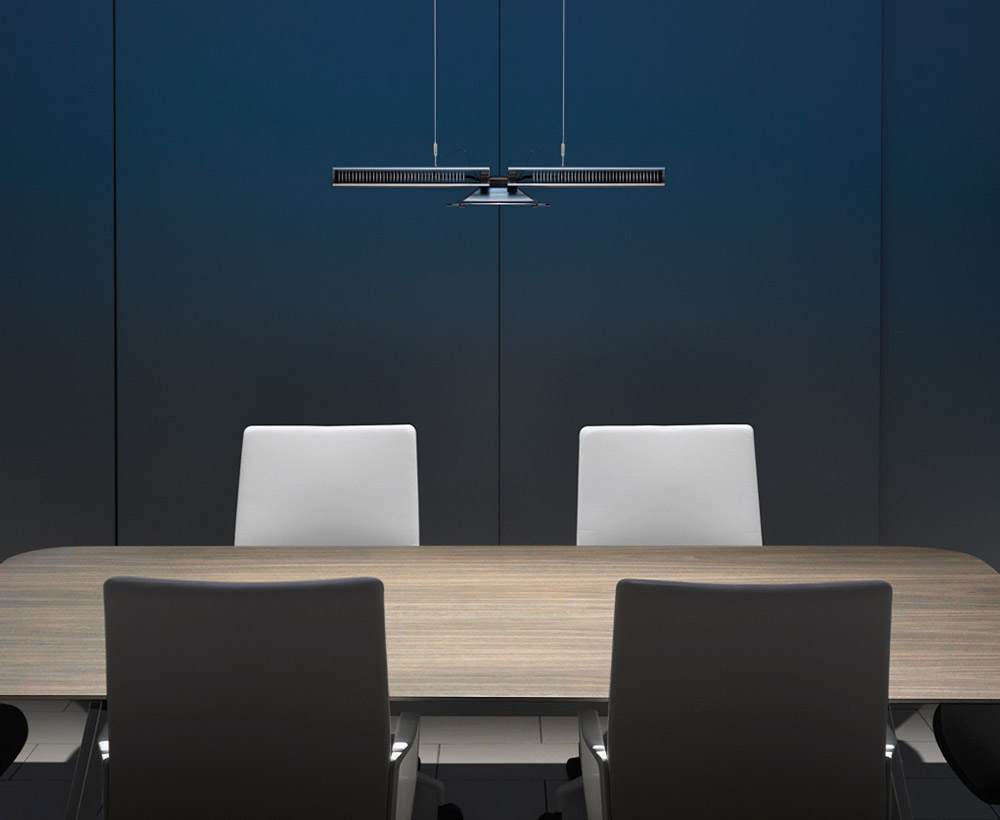 Cu-Beam down-light installed over bank of 2 desks.