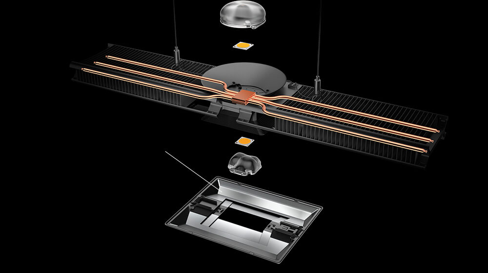 Exploded image of Cu-Beam showing LED, lens, heat pipes and shutters.